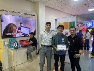 Three team members at PMG Open Doors event